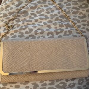 Elegant Cream Clutch with Gold Chain